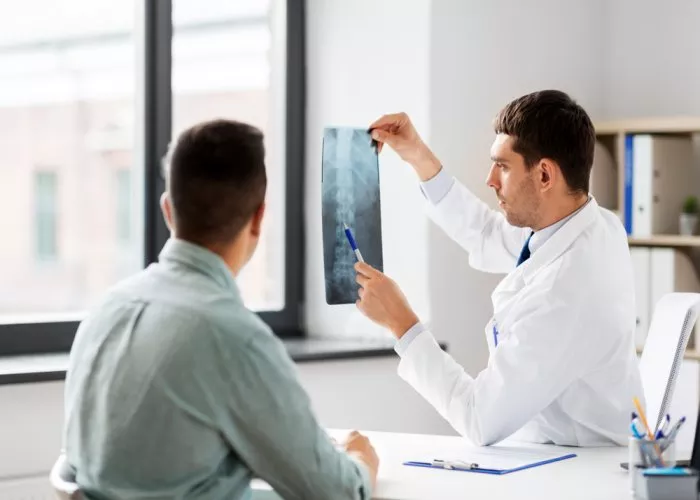 neurosurgeon vs orthopedic spine-surgeon