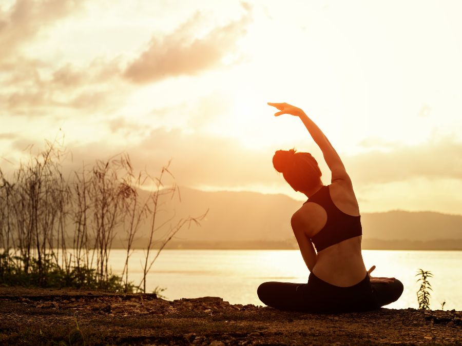 Woman practicing yoga for mind body wellness